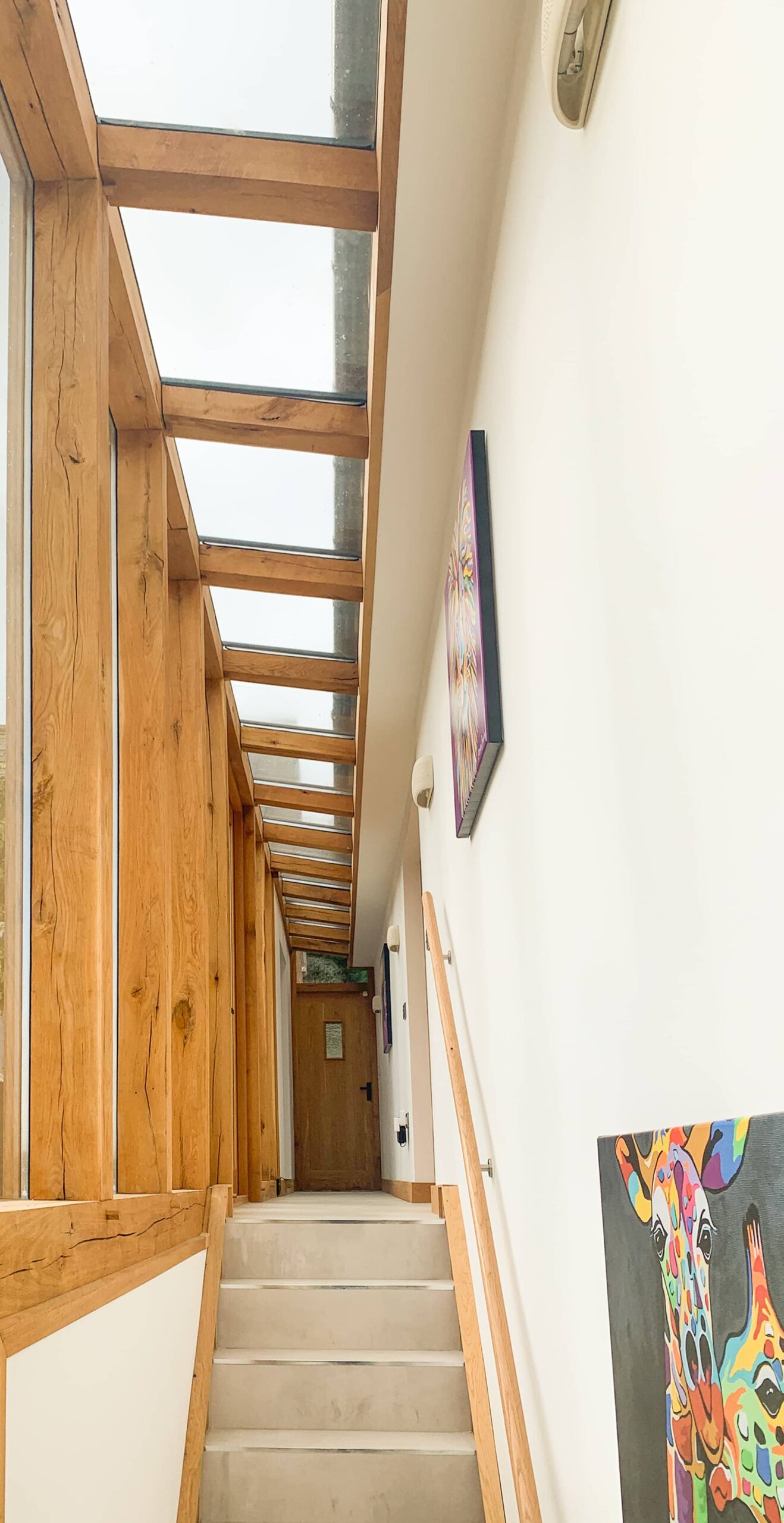 Simon Foote Architects Derby Residential Contemporary Timber Clad Extension Heritage Old School House Leckhampstead Newbury Brick Conversion Photograph of timber walkway link glass roof concrete floor